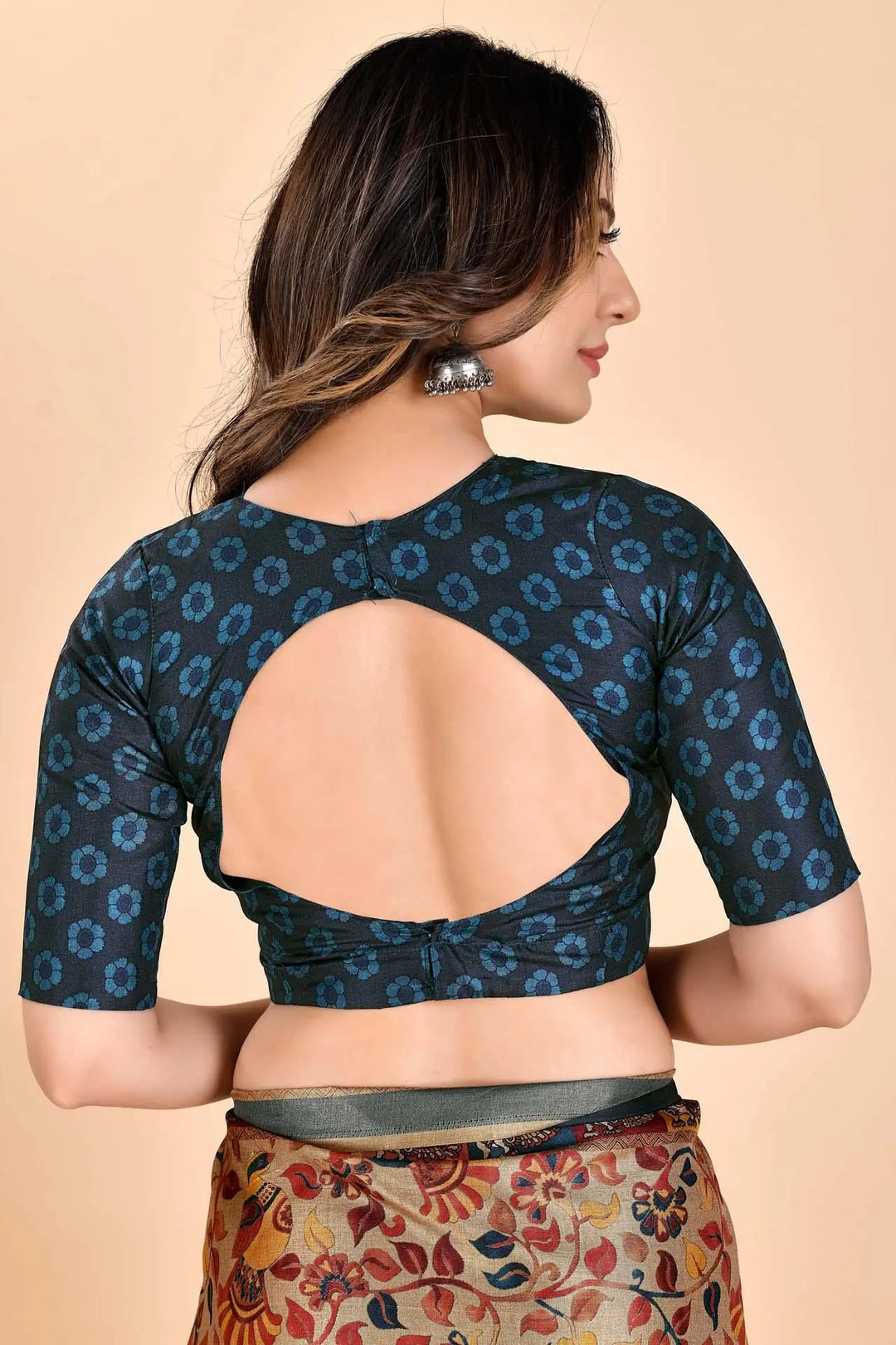 Woman wearing a Kalamkari Manipuri Sarees Blouse.