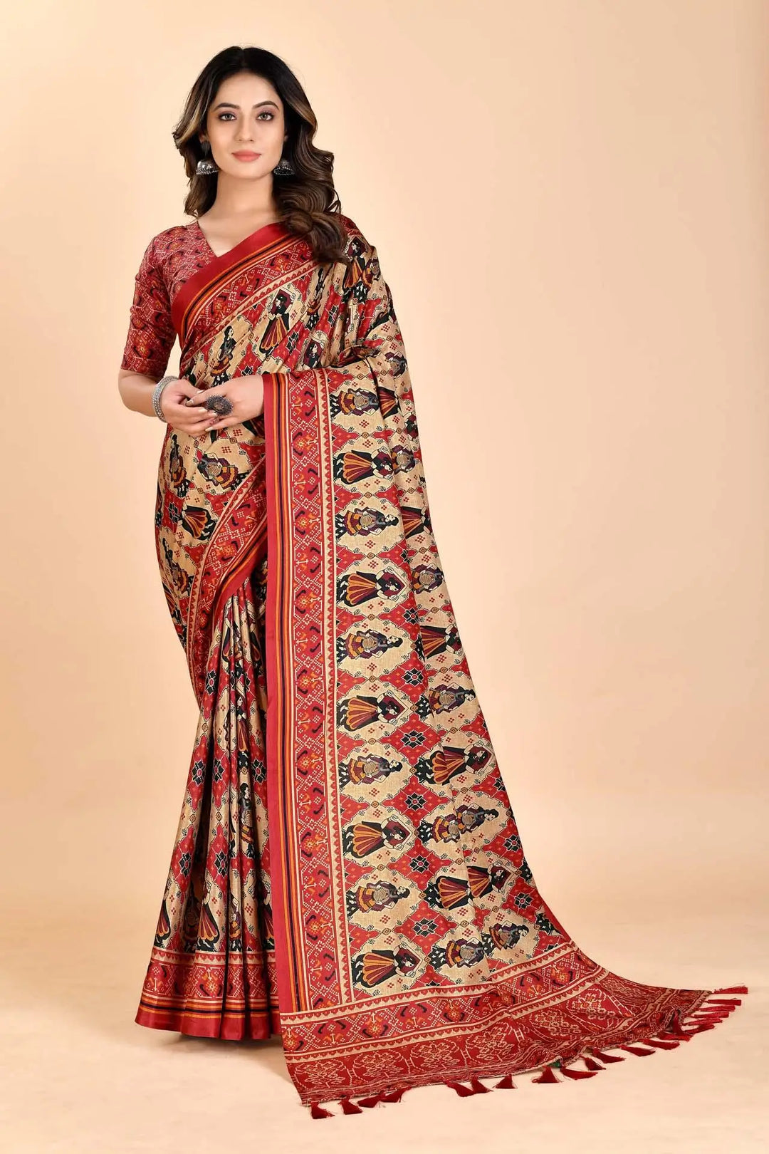 Woman wearing a Patola dolles Manipuri Saree.