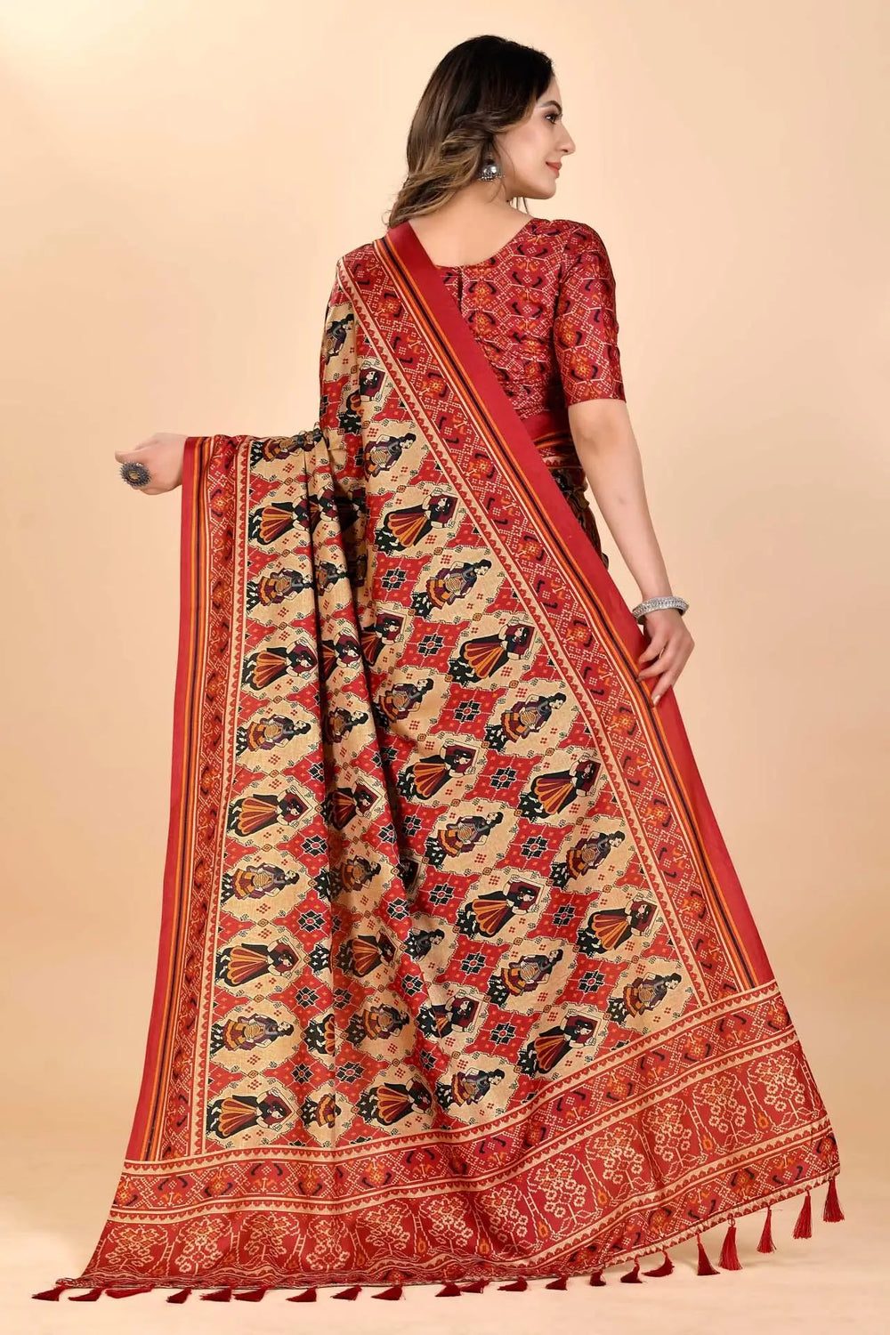 Woman wearing a Patola dolles Manipuri Saree.