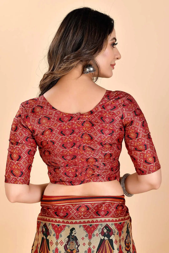 Woman wearing a Patola dolles Manipuri Sarees Blouse.