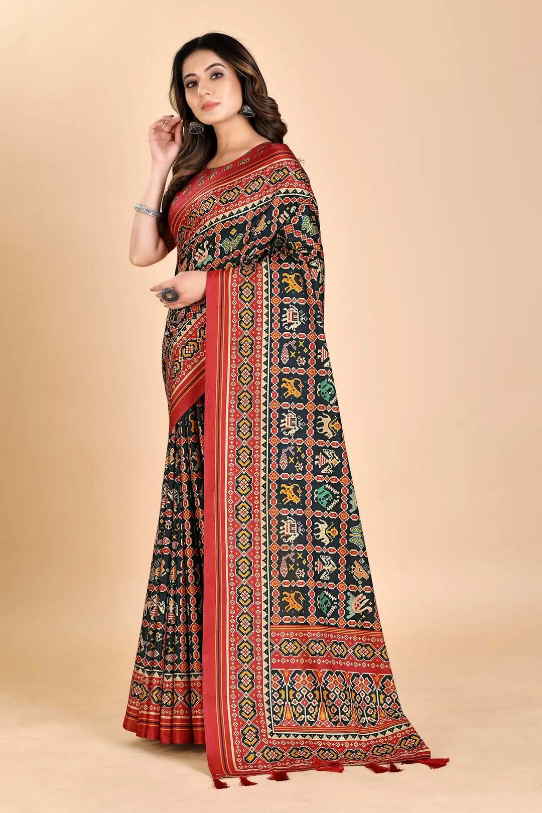 Woman wearing a Classic Patola Printed saree.