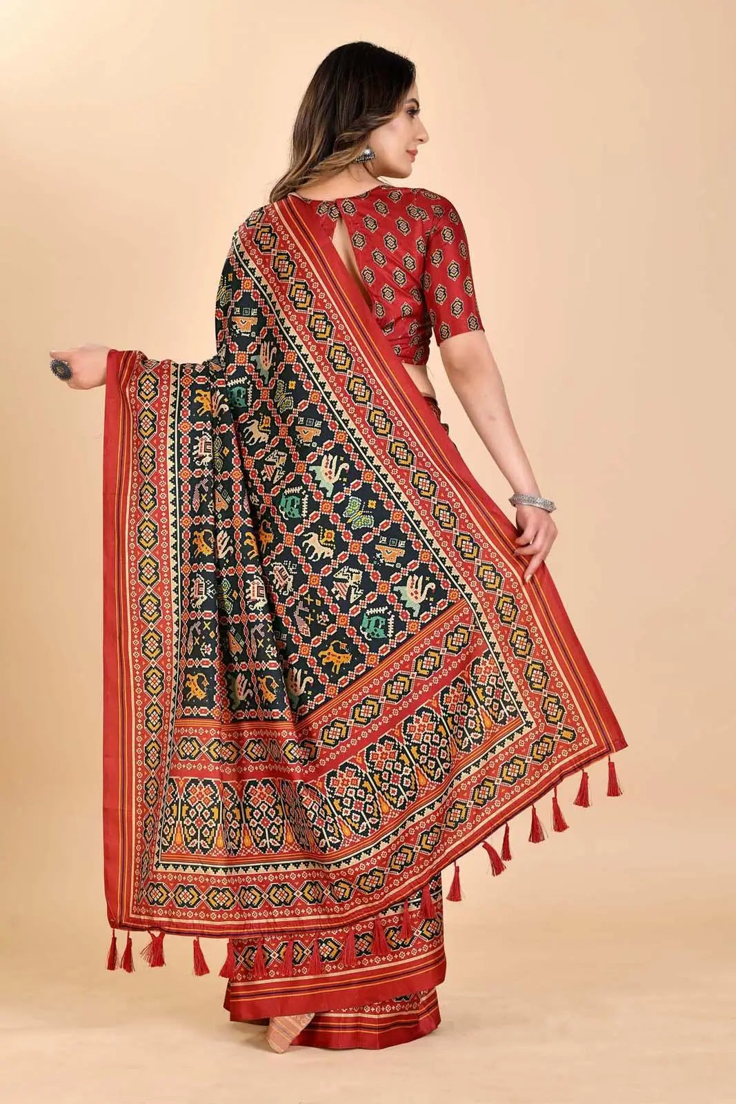 Woman wearing Classic Patola manipuri Printed saree.