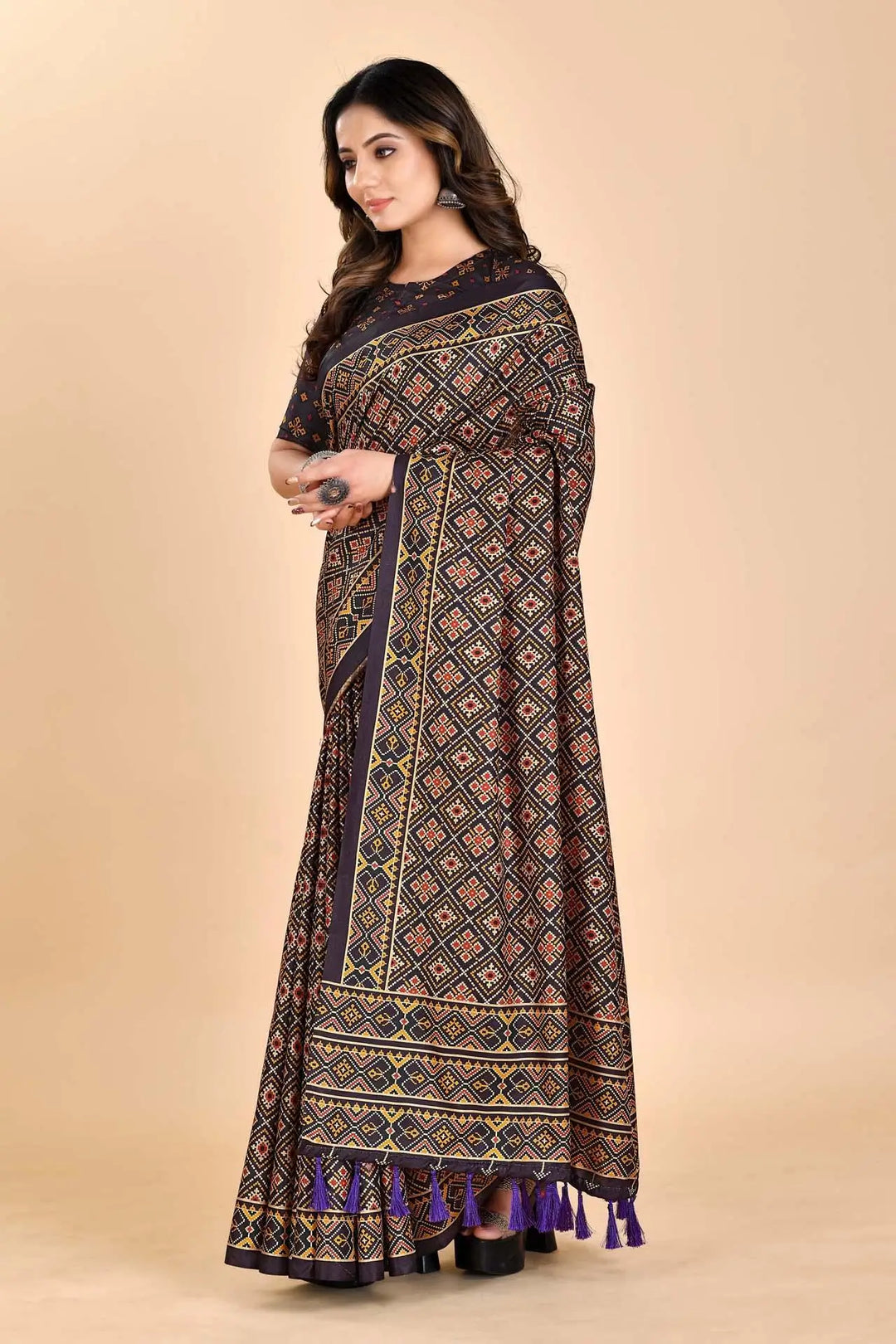 Woman wearing a Cube Patola printed Manipuri saree front view.