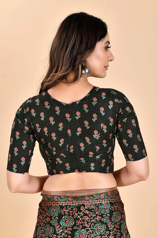 Woman wearing a Ajrakh butti Blouse.