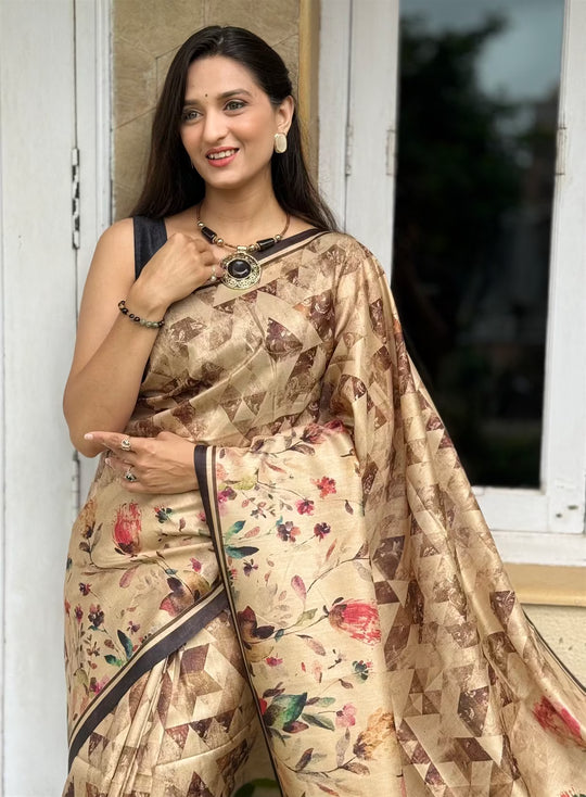 Woman wearing a Tussar Silk Floral with Abstract printed Saree.