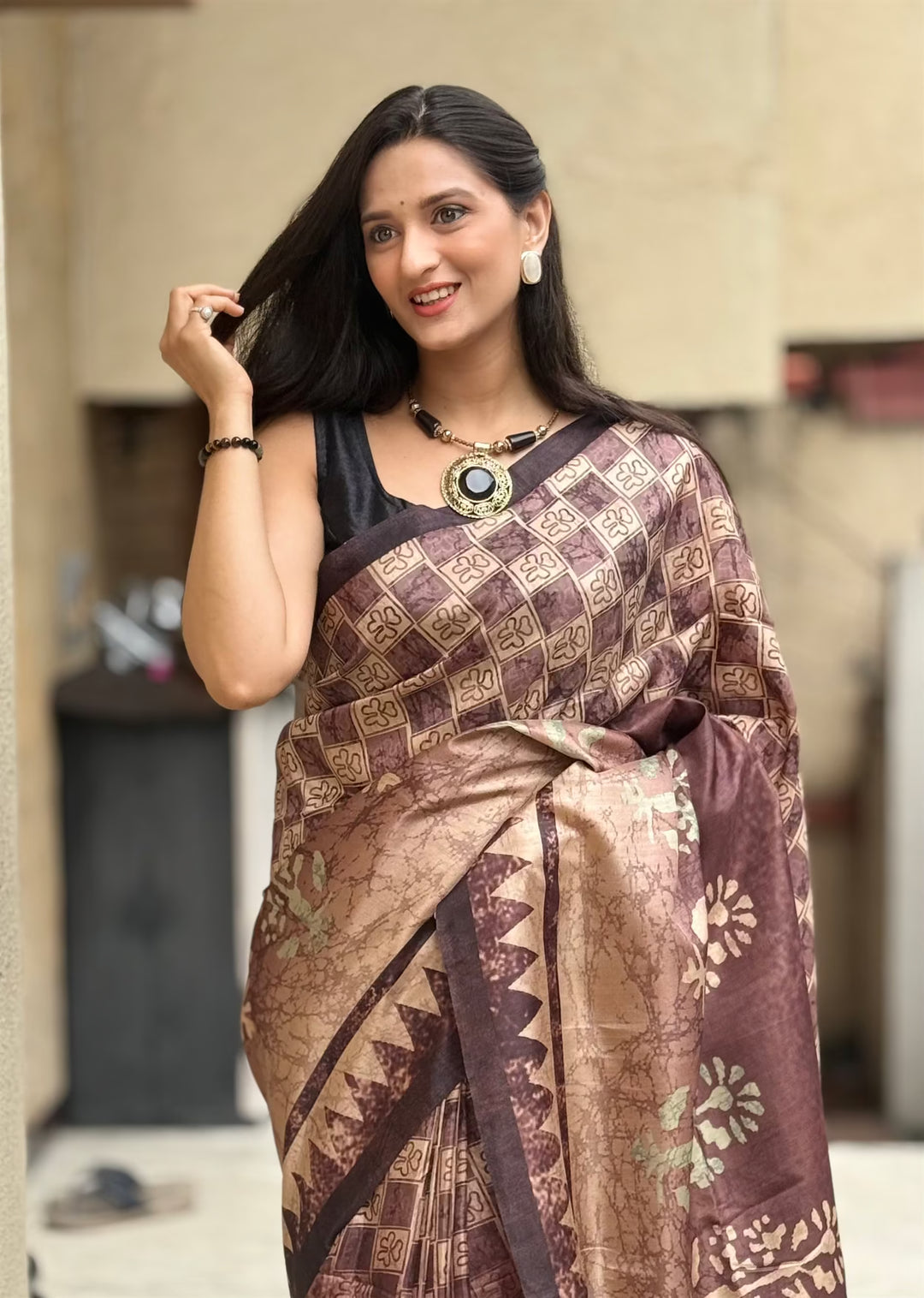 Geometric prints in rich Brown tone for woman by Ethnic Today.