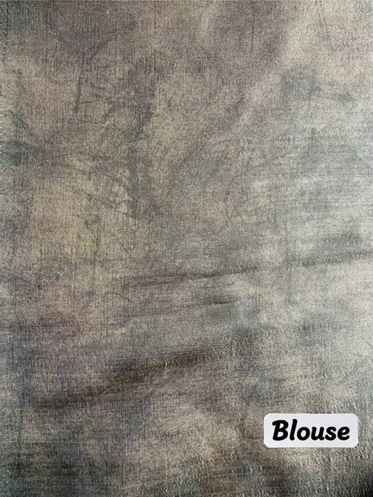 Grey toned printed blouse for woman.