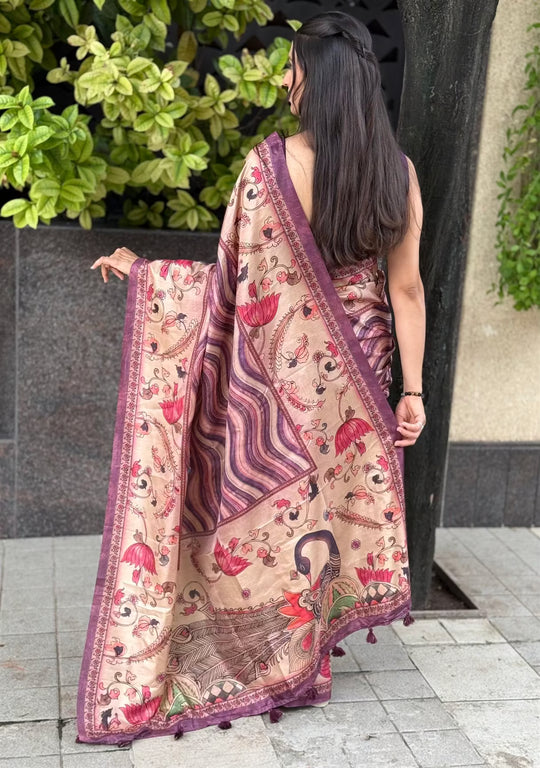 Woman in Purple toned Leriya with Floral Border saree.
