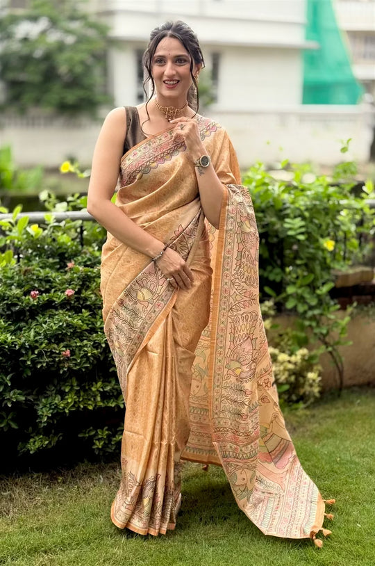 Woman wearing a Mustard Matsya Madhubani printed saree.