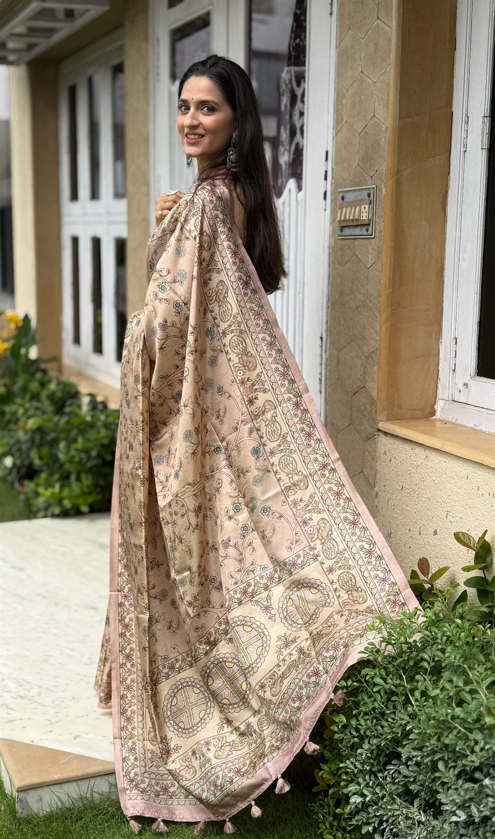 Woman in Madhubani Pallu with Kalamkari Pattern saree.