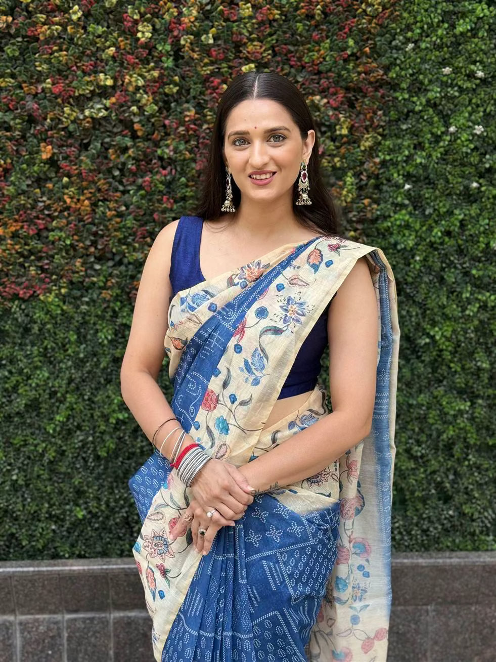 Women wearing Bandhani With Floral Border Chanderi Silk Saree by Ethnic Today.