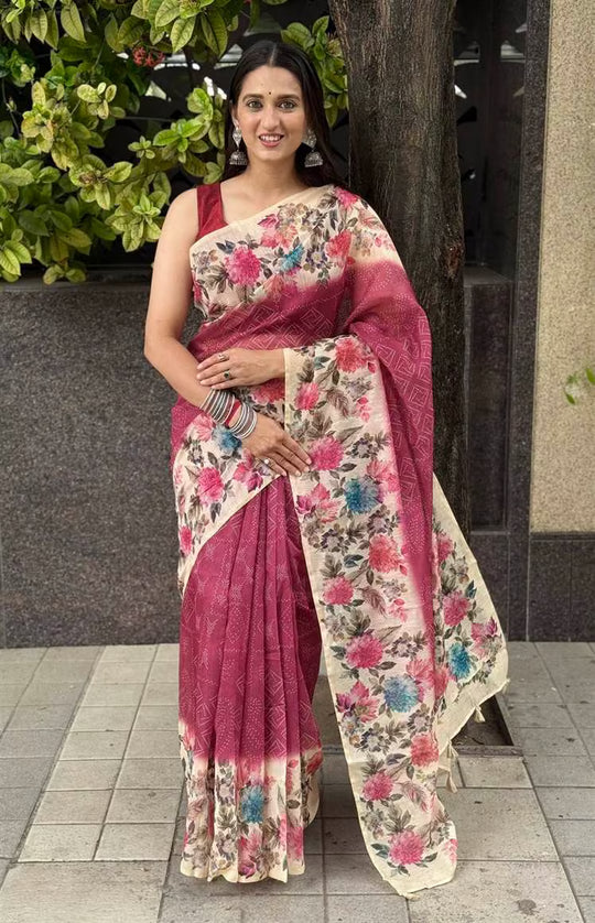 Woman wearing Maroon Bandhani Print with Floral Border Silk Saree.