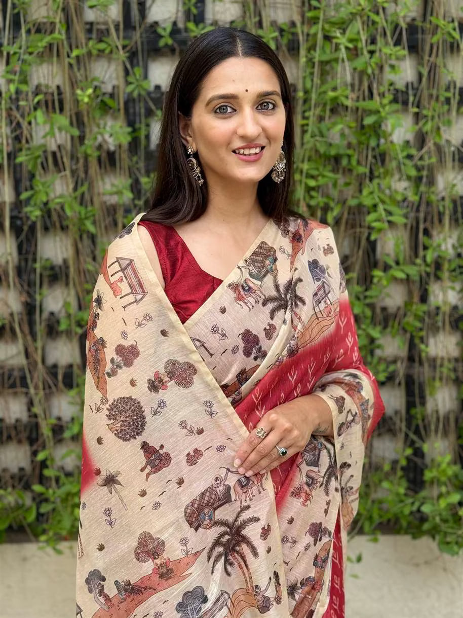 Woman wearing Red Saree with Ikkat Butta & Kalamkari Border.