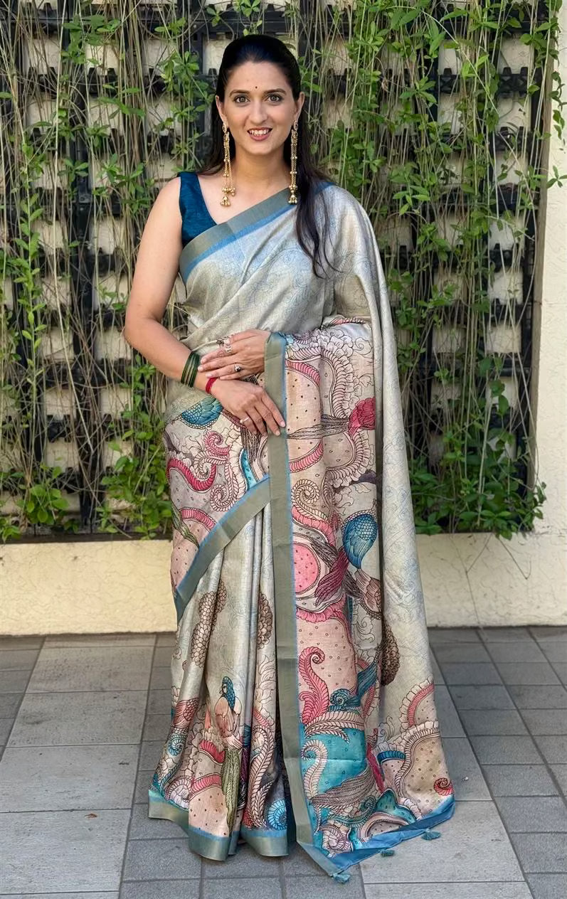 Woman wearing a traditional saree with a Bird design by Ethnic Today.