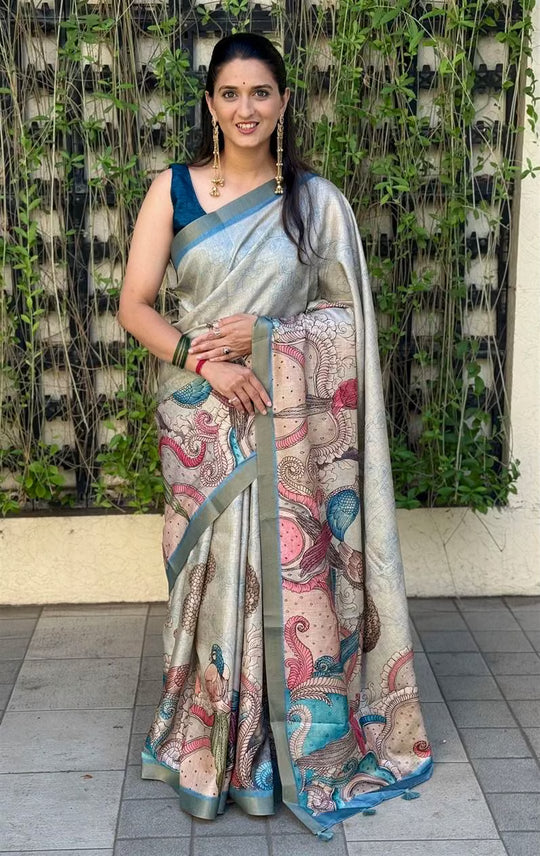 Woman wearing a traditional saree with a Bird design by Ethnic Today.