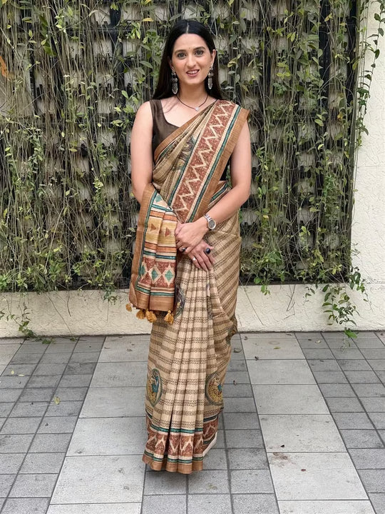 Woman wearing a Chevron zigzag with Brown printed border saree.