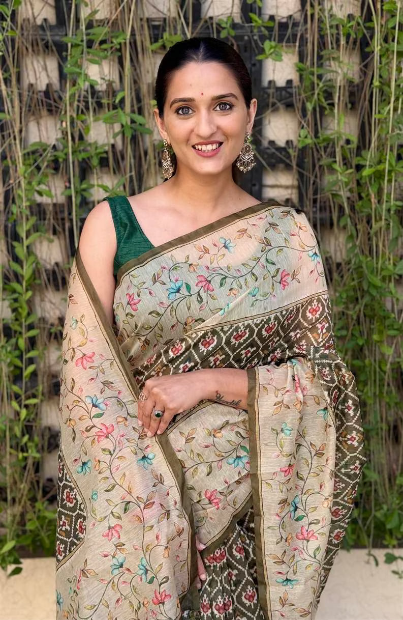 Woman in Mehndi Patola with Beige Floral Print Silk Saree.