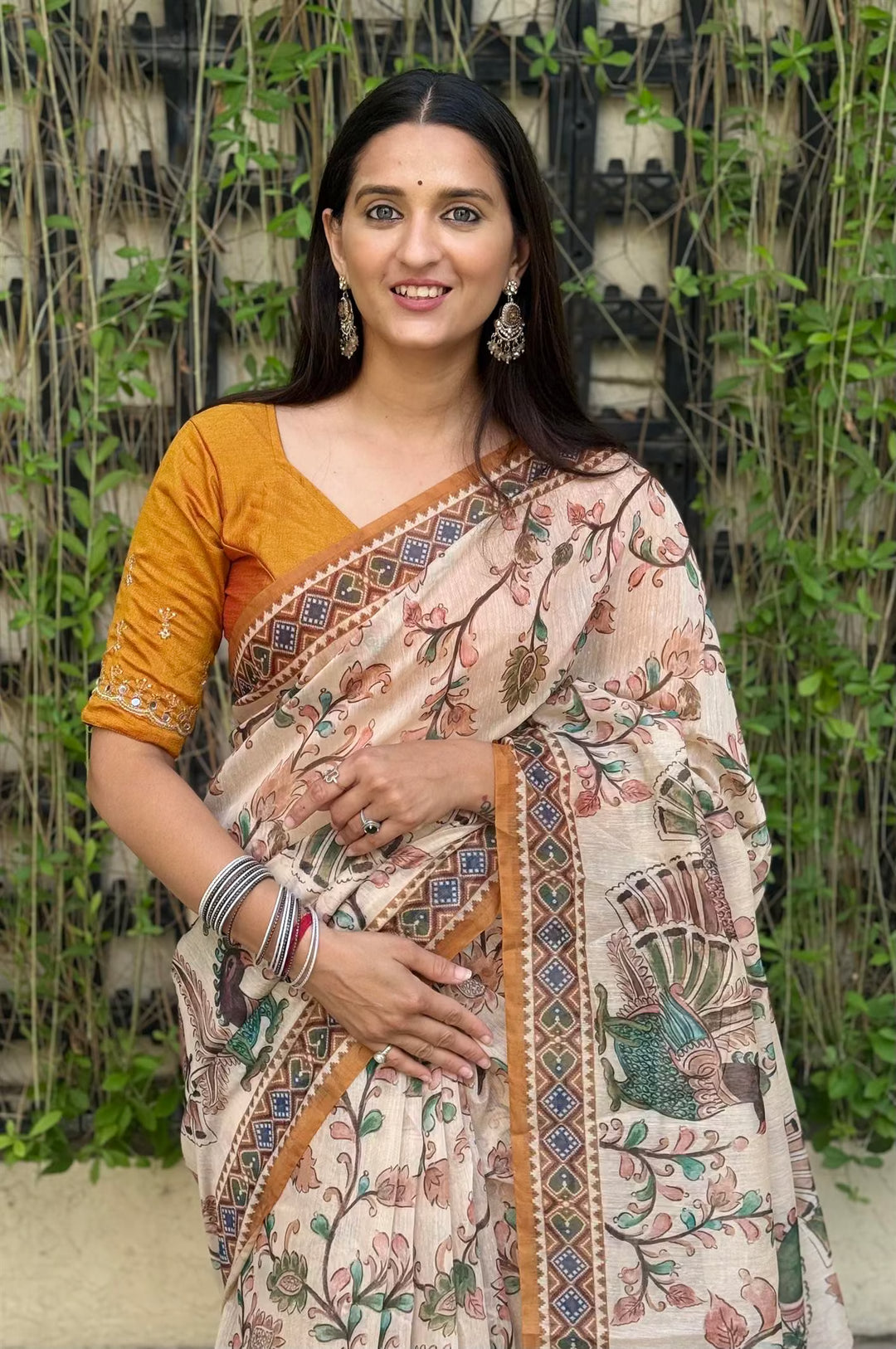 Woman in Mustard colour Saree.