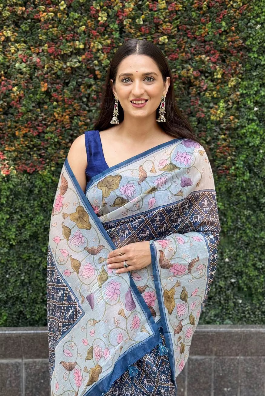 Woman wearing Lotus Patola Chanderi Silk Saree.