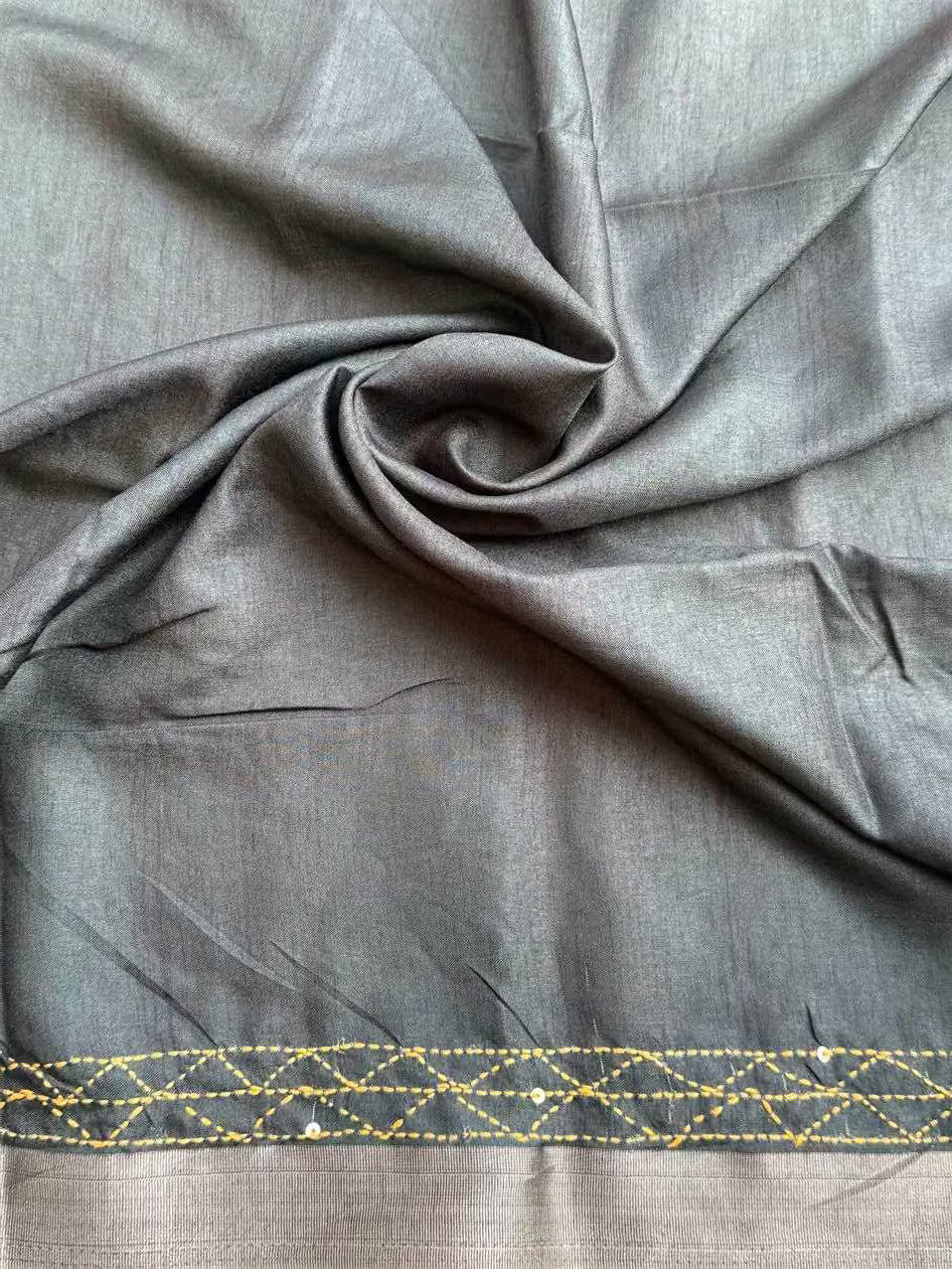 Green blouse fabric in katha work with zari border by Ethnic Today.