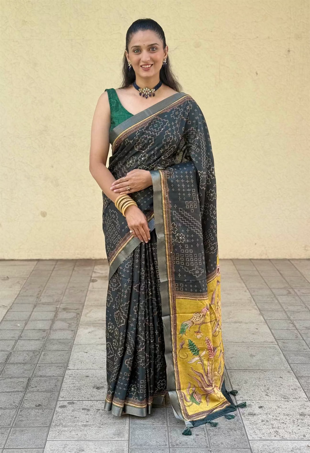 Woman in Green Katha work saree by Ethnic Today.
