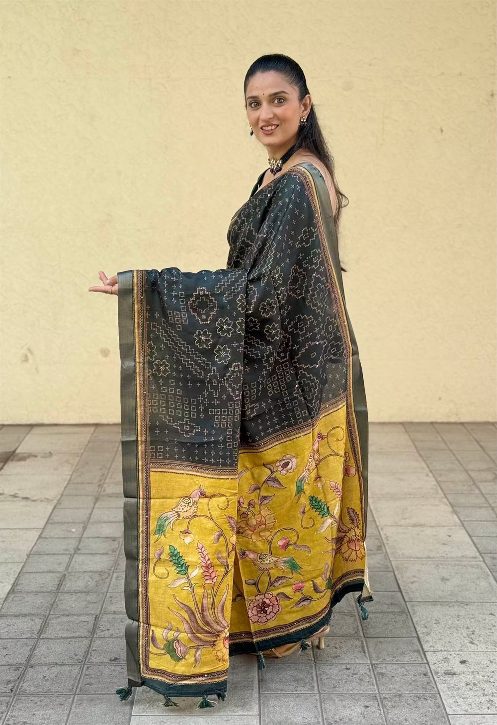 Woman wearing Green & Yellow Bandhani Katha Dola Silk Saree by Ethnic Today.