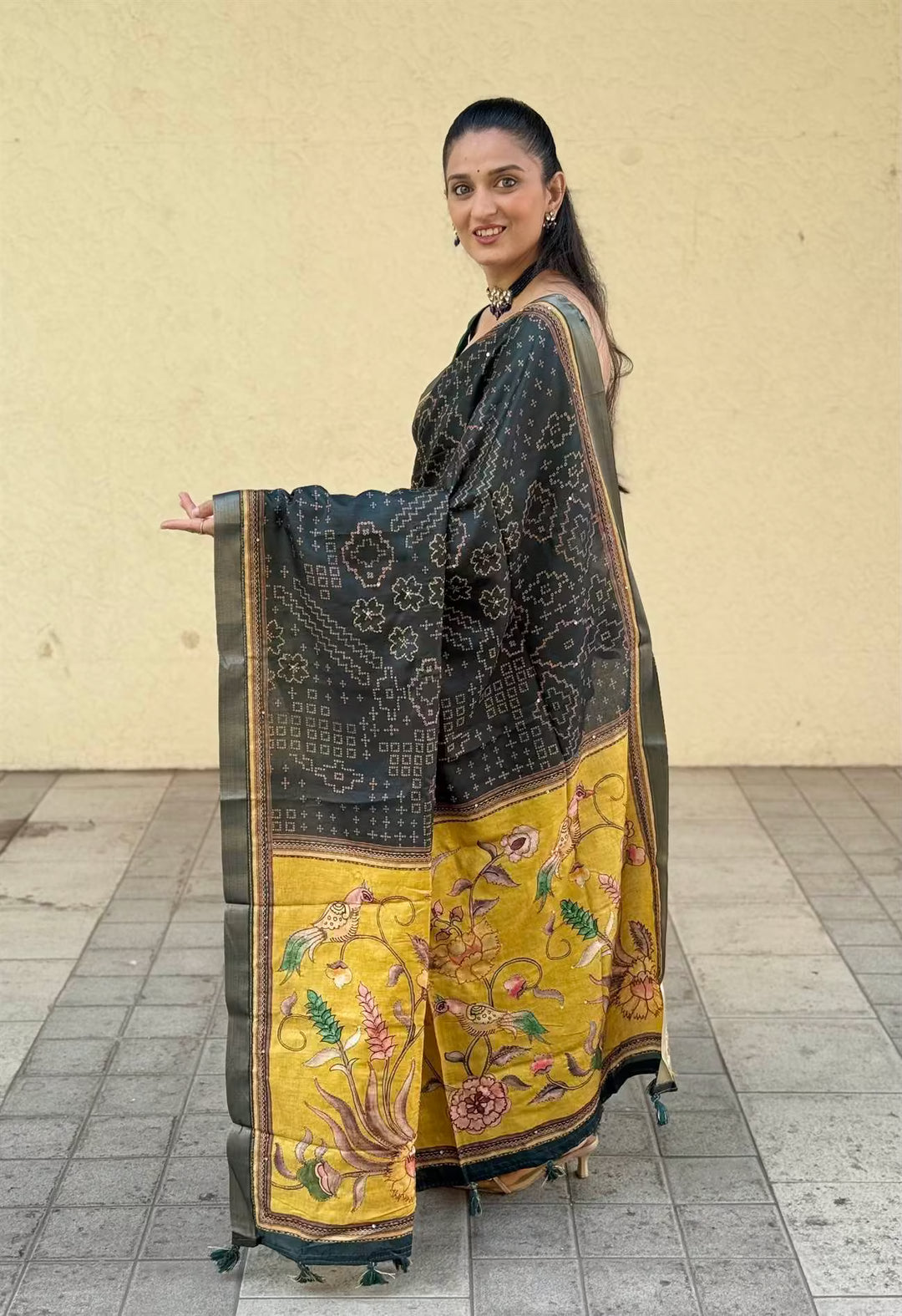 Woman wearing Green & Yellow Bandhani Katha Dola Silk Saree by Ethnic Today.