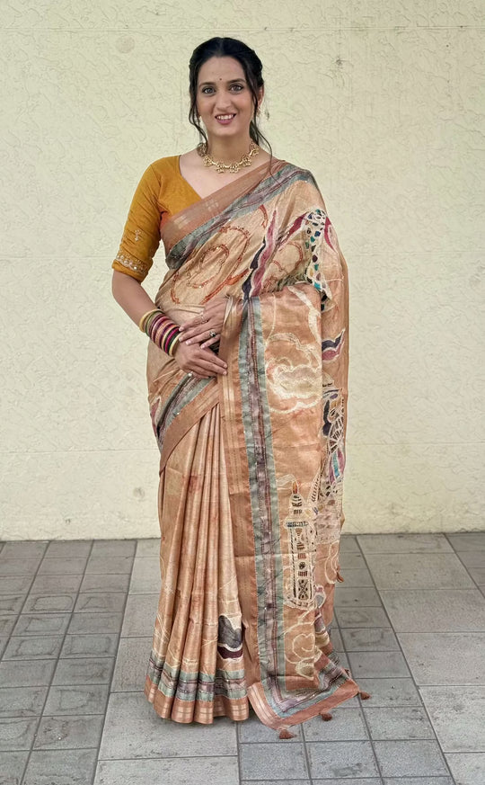 Woman in Abstract Print & Kalamkari Pallu Saree with Zari border. 