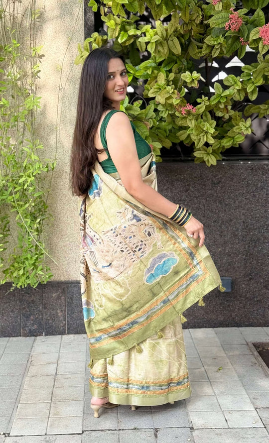 Woman wearing Olive Green Katha & Kalamkari Dola Silk Saree.