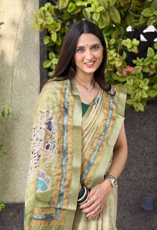 Woman in Olive Green Katha & Kalamkari Dola Silk Saree.