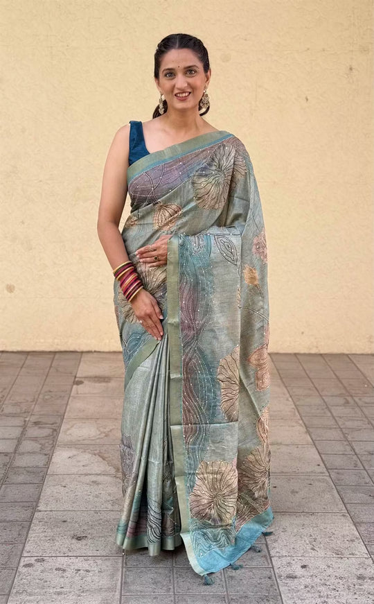 Woman wearing a traditional saree by Ethnic Today.