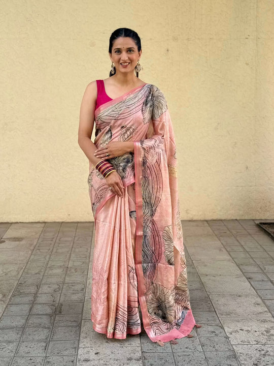 Woman in Dusty Rose saree by Ethnic Today.