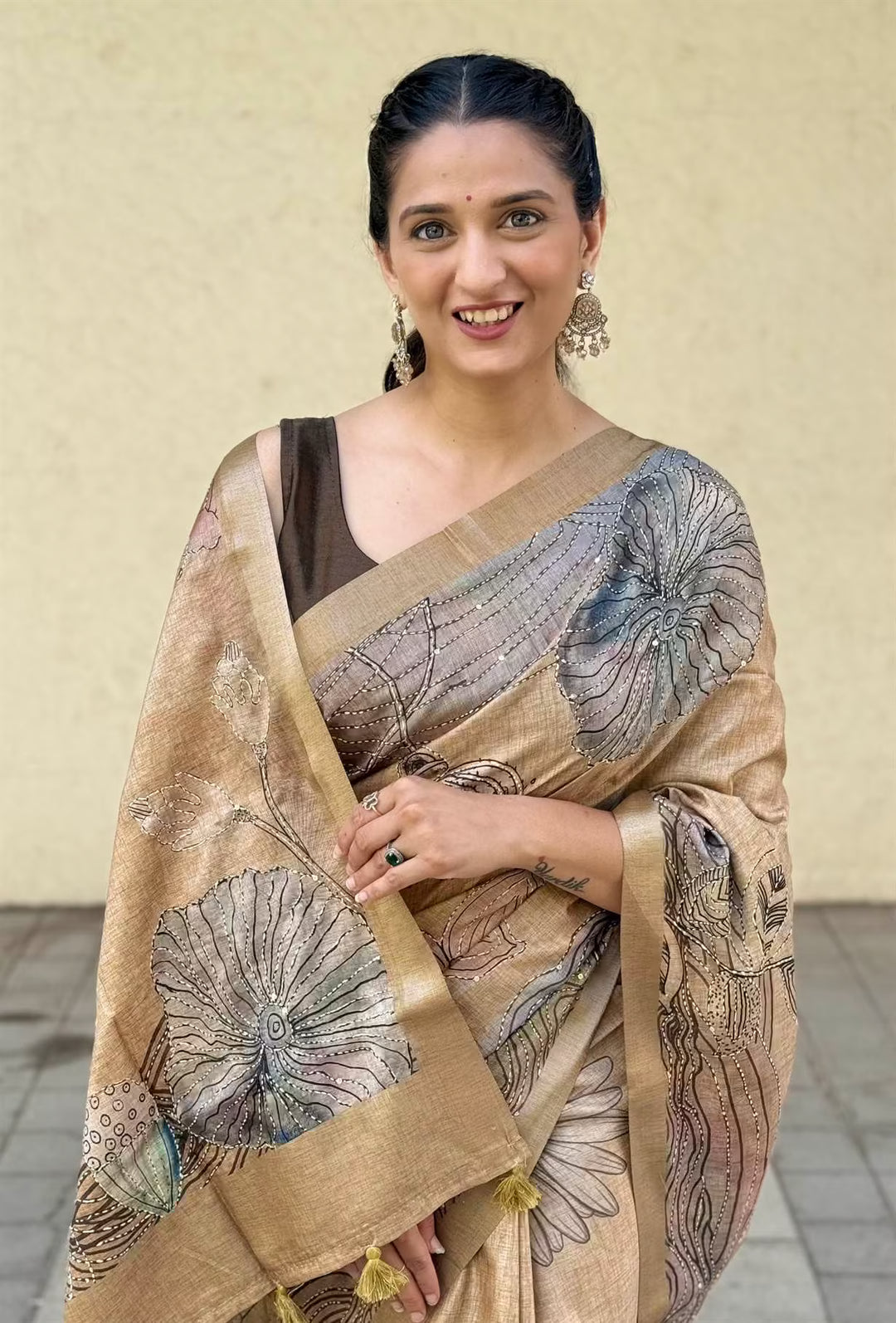Woman in Beige Champagne Lotus Katha Work Silk Saree.