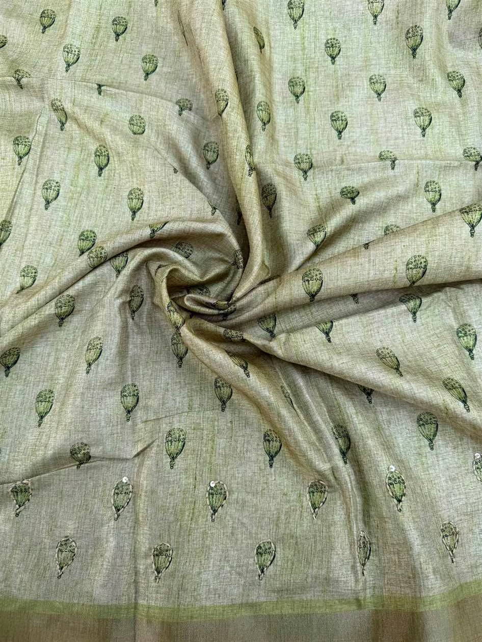 Green blouse fabric in katha work with zari border by Ethnic Today.