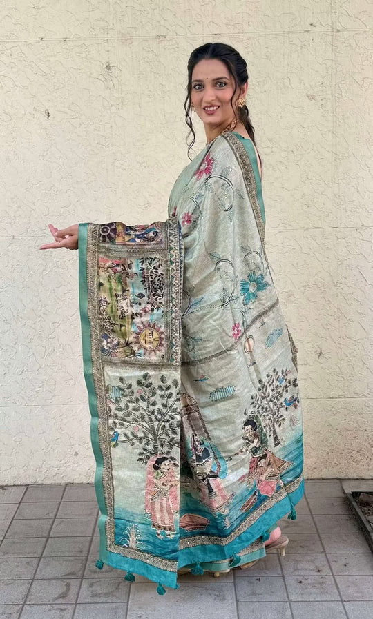 Woman wearingSea Blue Madhubani Katha Dola Silk Saree by Ethnic Today.