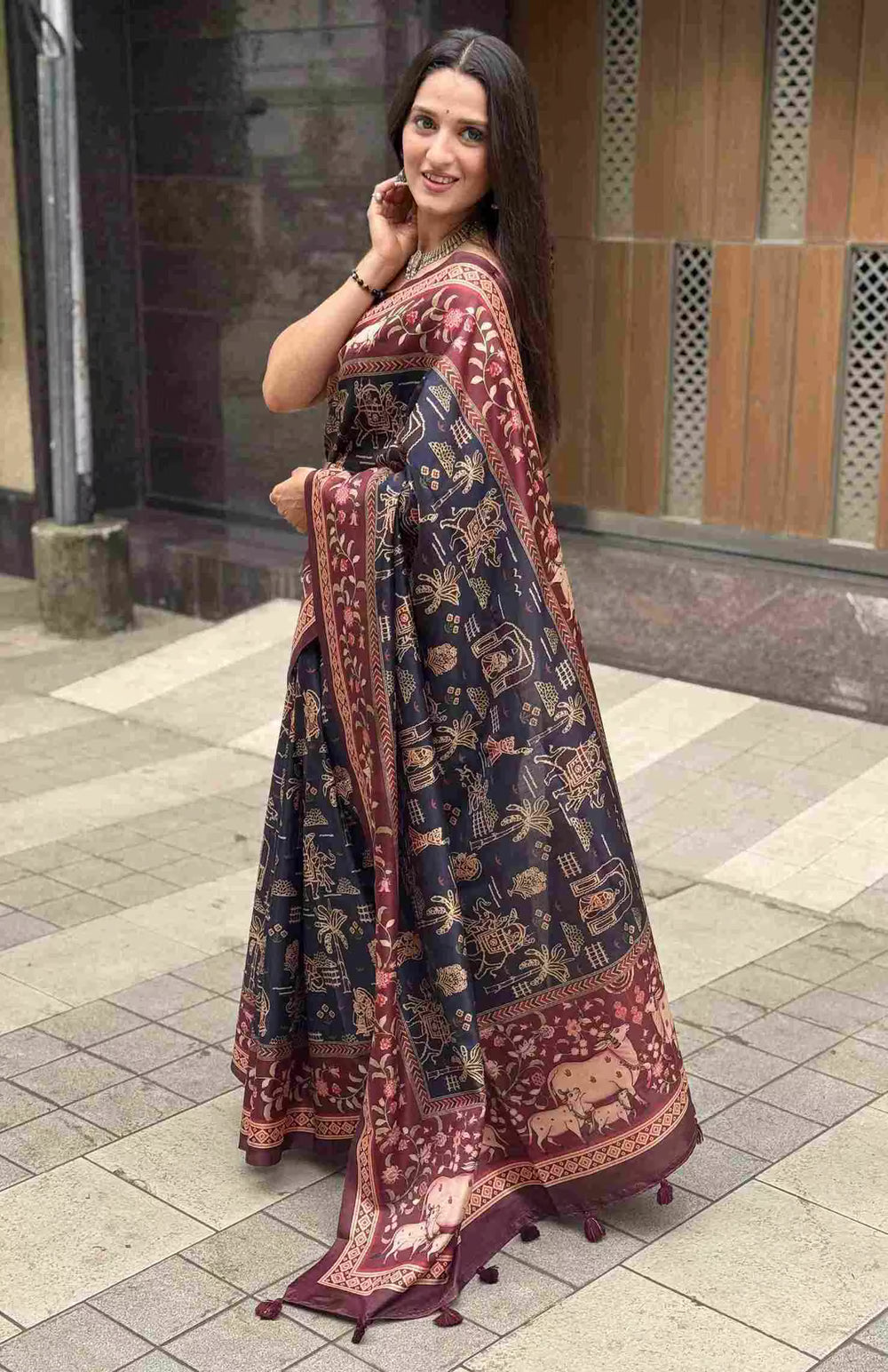 Woman in Lotus & Cow Designer Pichwai Chanderi printed saree.	