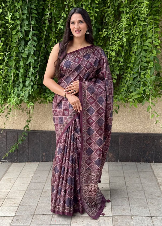 Woman wearing a Ajrakh pattern with Traditional Block inspired motifs saree.