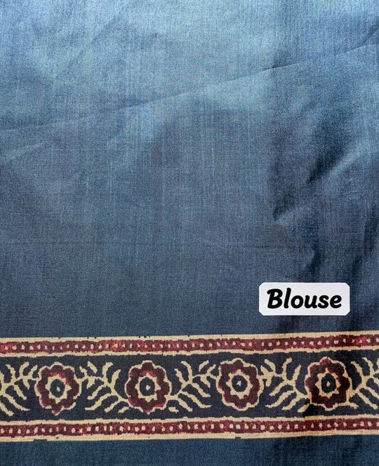 Plain blouse highlighted with a Floral printed border design.
