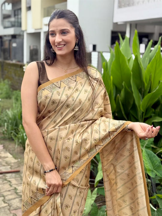 Printed saree with Madhubani style border and tassels for woman by Ethnic Today.