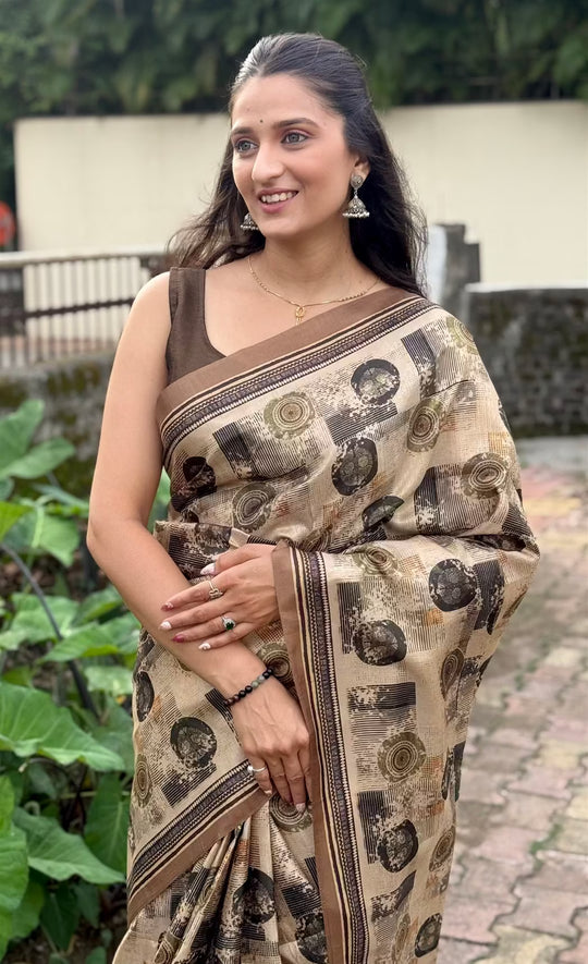 Woman in Beige Colour with Block Print saree.