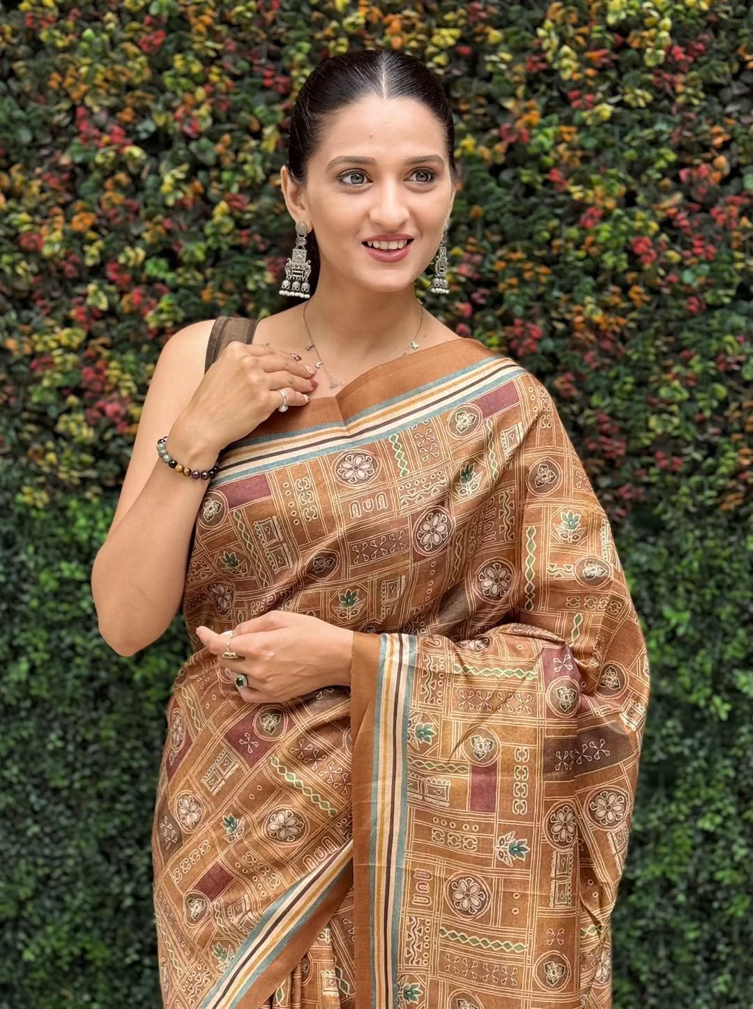 Brown shade with Geometric and Tribal inspired motif saree for woman by Ethnic Today.