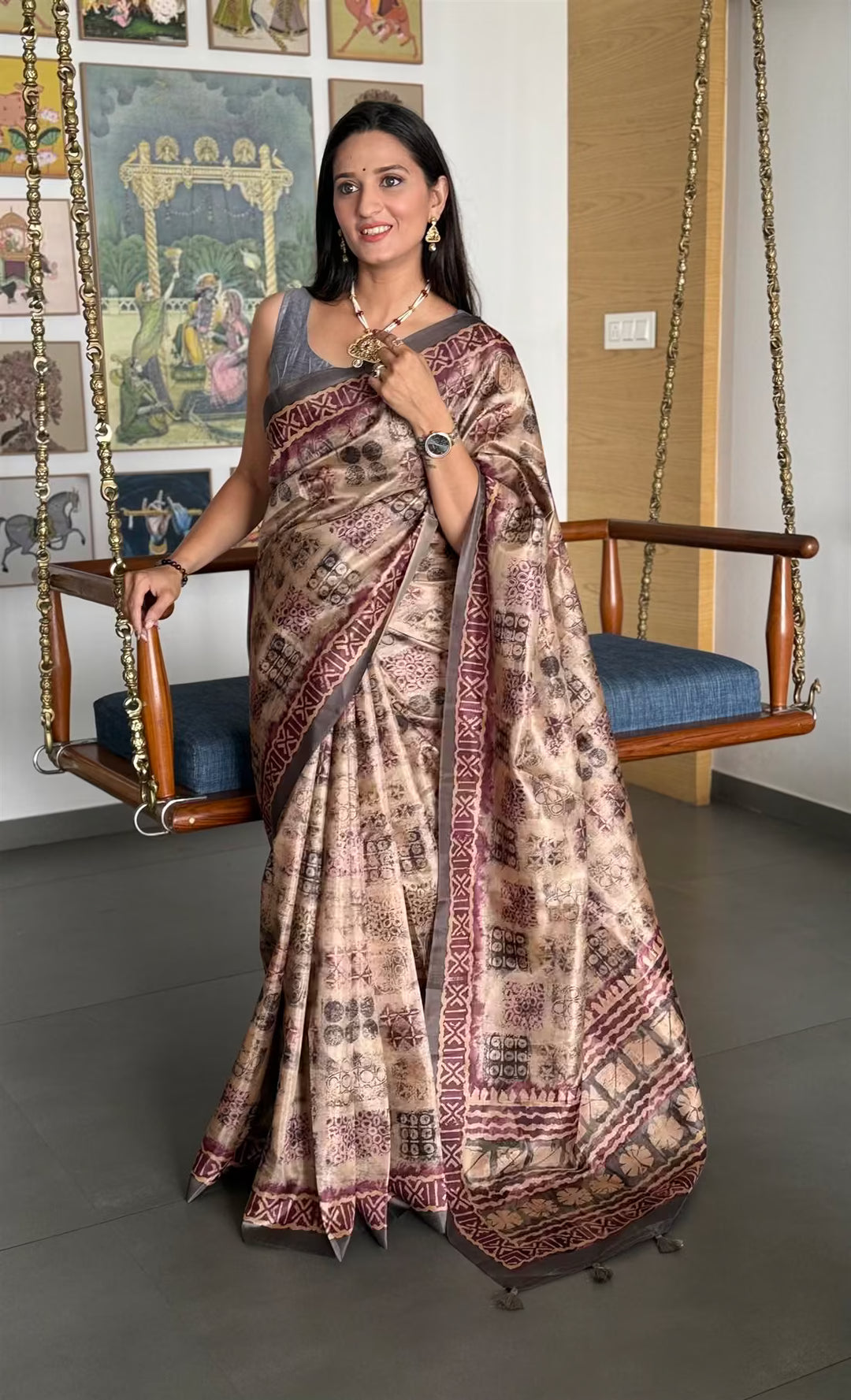 Woman wearing a Block Print Beige Colour Tussar Silk Saree.