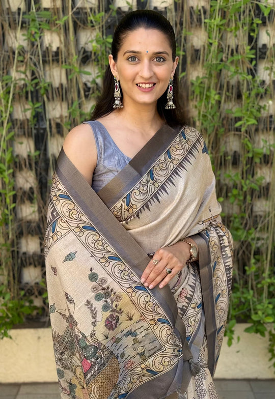 Woman Wearing Ash Grey Saree in Kalamkari Print.