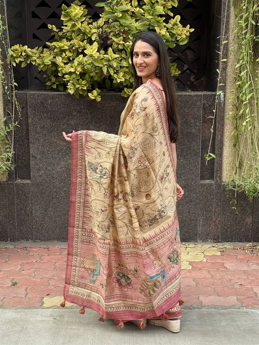 Woman in Kalamkari Beige Base With Pink Pallu.