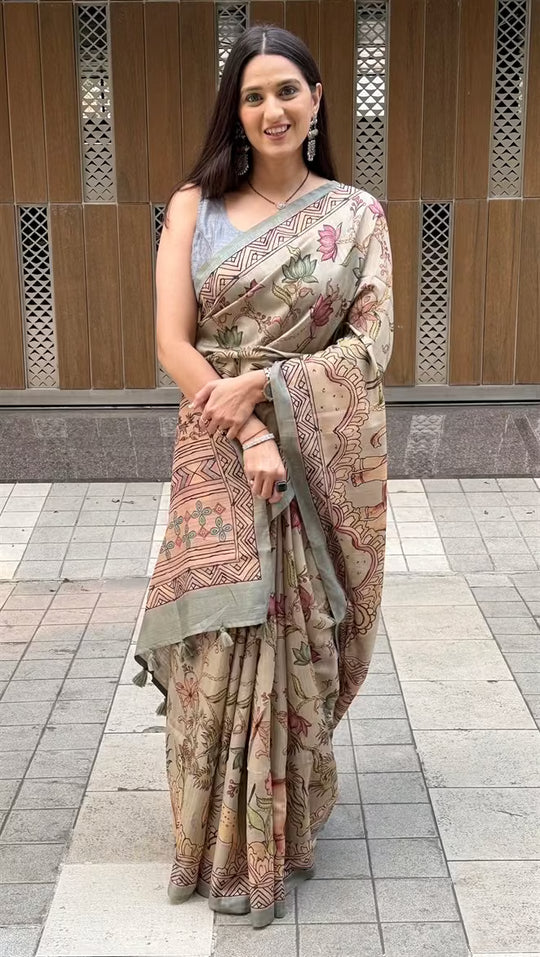 Woman wearing a Kalamkari Lotus Jaal Soft silk saree.