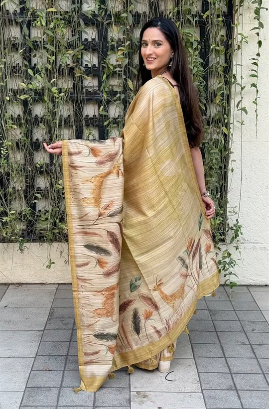 Woman in Golden Yellow Botanical printed saree.