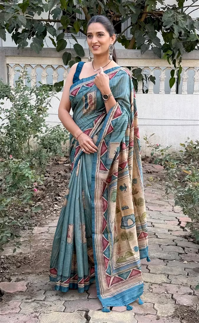 Woman in Ocean Blue Madhubani Pattern Soft silk saree.