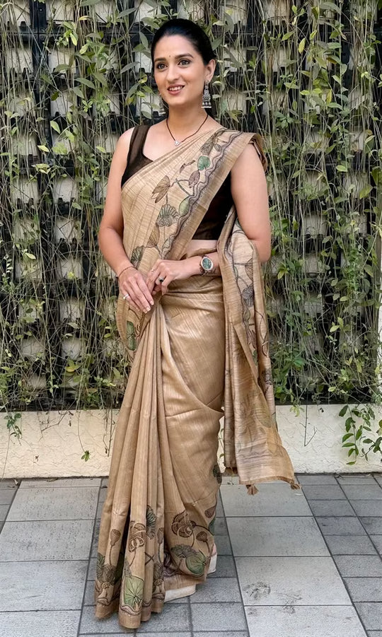Woman wearing a Water Lotus Garden print saree.
