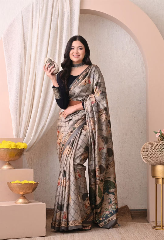 Woman wearing a Pichwai Gray Colour Printed saree.