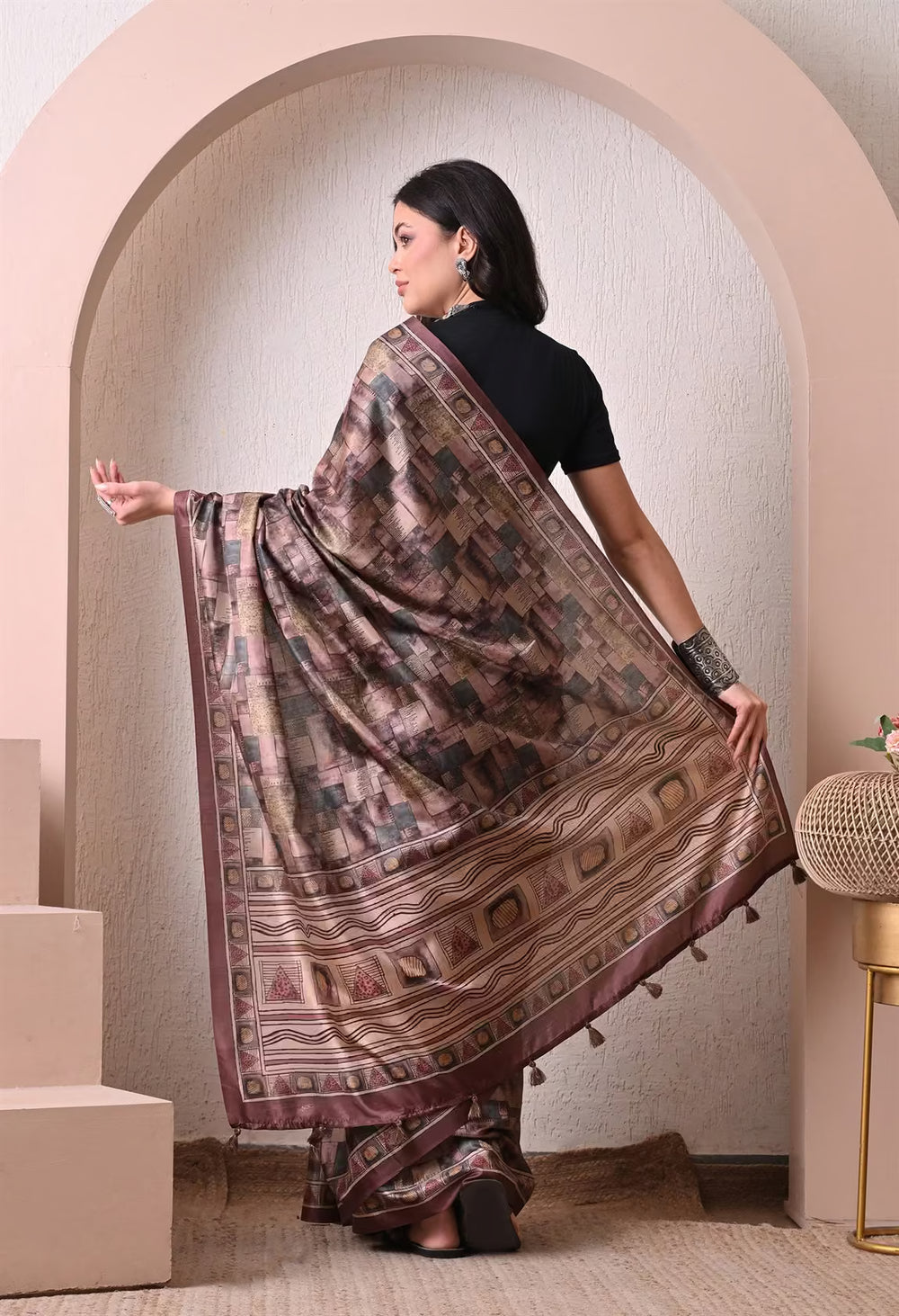 Woman in Abstract Box Pattern with Geometric bordered pallu saree.